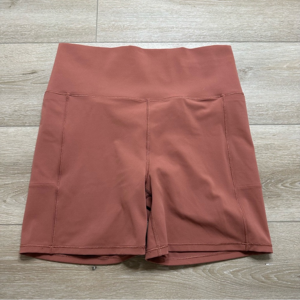 Vuori Women's Studio Pocket Biker Athletic Shorts - Rust Orange
